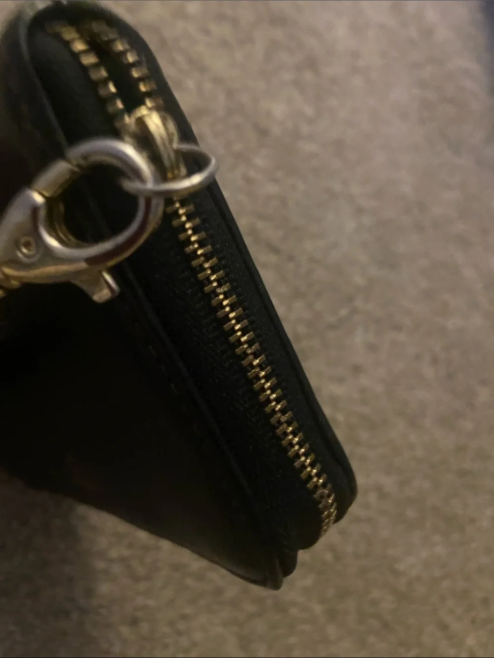 Fossil Black Leather Zip Wristlet with Gold Accent, gently used lots of life.